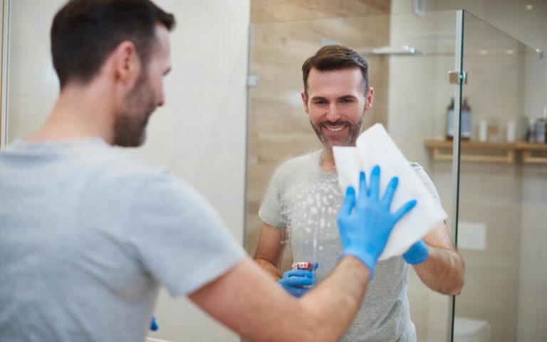 happy-man-cleaning-his-home-2021-08-26-20-15-41-utc.jpg